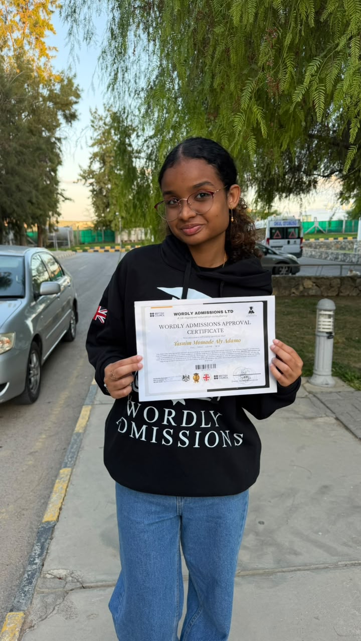 Tasnim Momade Aly Adamo — Wordly Admissions student holding her approval certificate