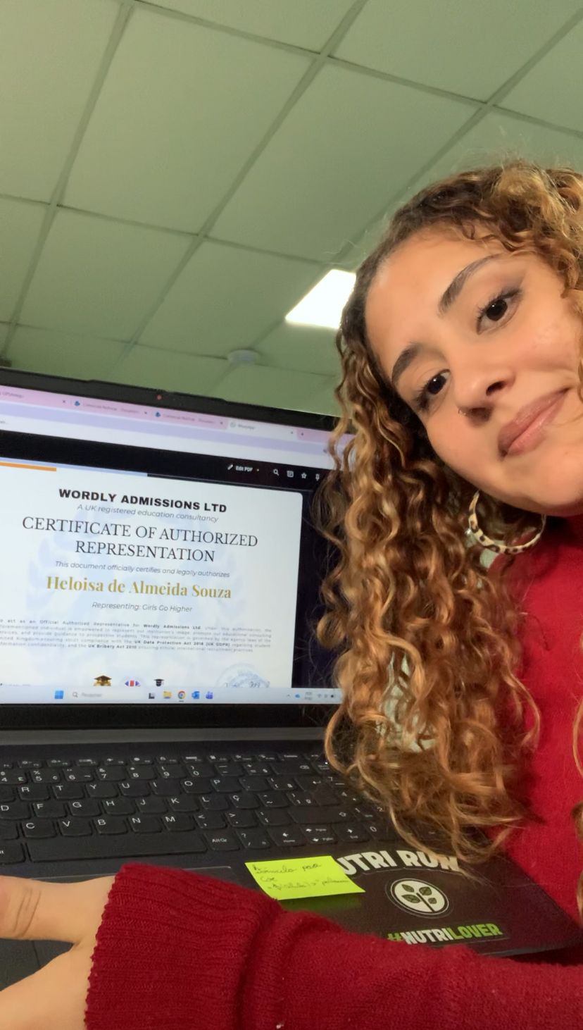 Heloisa de Almeida Souza, official representative for Girls, Go Higher!, with her Wordly Admissions Certificate of Authorized Representation.